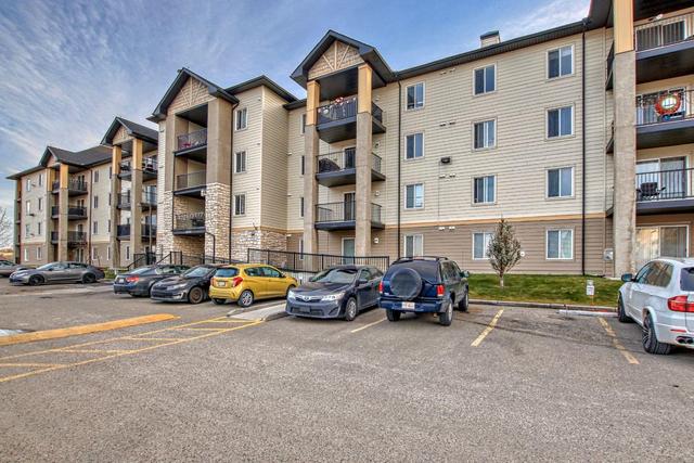 6304 - 304 Mackenzie Way Sw, Condo with 2 bedrooms, 1 bathrooms and 1 parking in Airdrie AB | Image 1