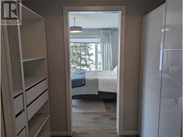 104 - 3398 Mckinley Beach Lane, House attached with 2 bedrooms, 2 bathrooms and 1 parking in Kelowna BC | Image 21