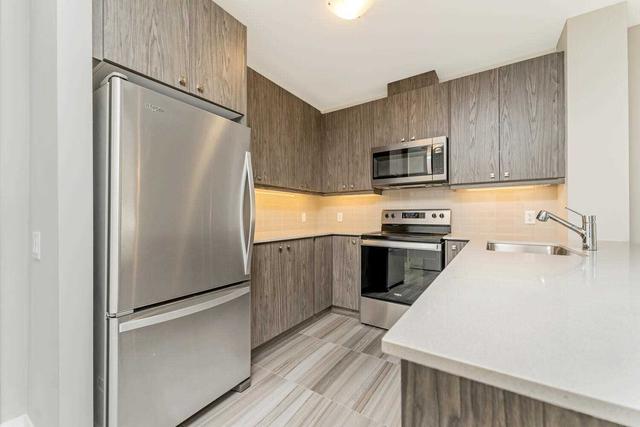 111 - 830 Megson Terr, Condo with 2 bedrooms, 2 bathrooms and 2 parking in Milton ON | Image 2