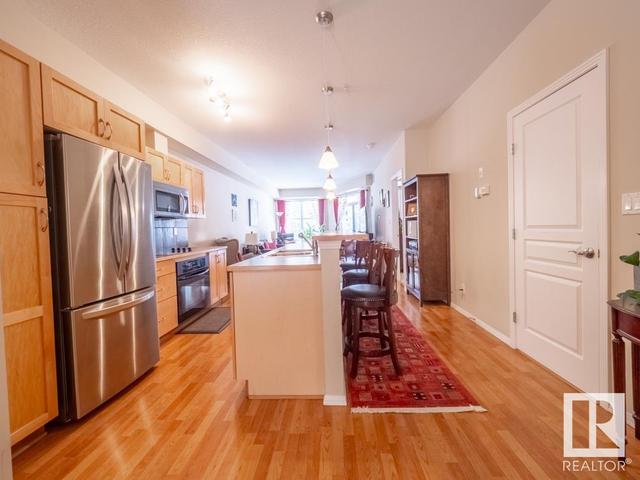 310 - 10503 98 Av Nw, Condo with 2 bedrooms, 2 bathrooms and 1 parking in Edmonton AB | Card Image
