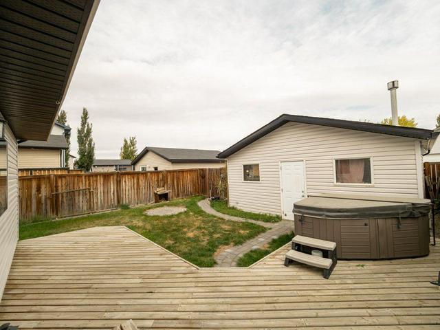 140 Jessie Robinson Close N, House detached with 4 bedrooms, 2 bathrooms and 3 parking in Lethbridge AB | Image 38