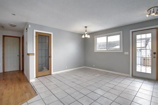 63 Aberfoyle Close Ne, House detached with 4 bedrooms, 2 bathrooms and 2 parking in Calgary AB | Image 5