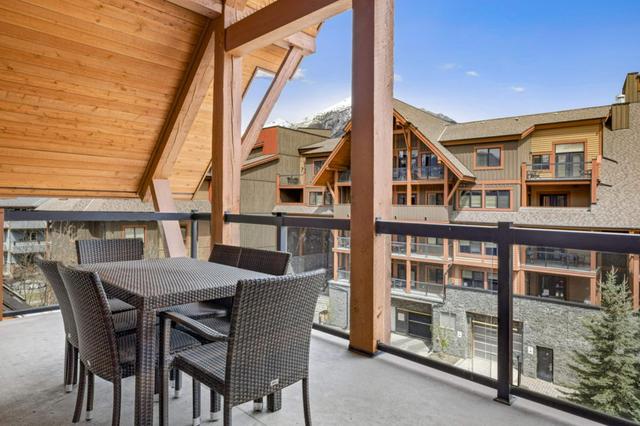 401 - 191 Kananaskis Way, Condo with 2 bedrooms, 2 bathrooms and 1 parking in Canmore AB | Image 6