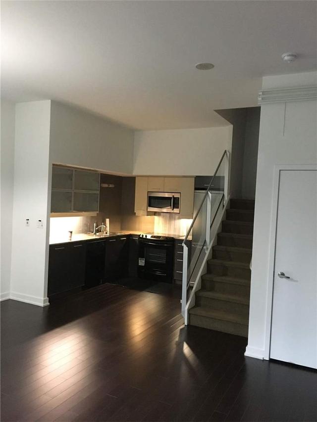 g15 - 18 Telegram Mews, Townhouse with 3 bedrooms, 3 bathrooms and 2 parking in Toronto ON | Image 1