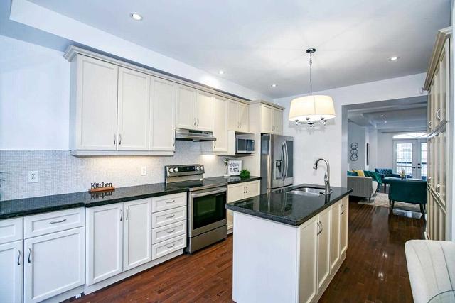 24 Routliffe Lane, House attached with 4 bedrooms, 3 bathrooms and 2 parking in Toronto ON | Image 2