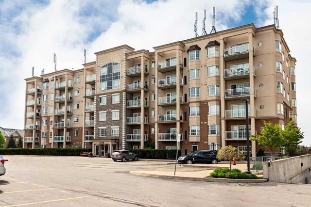 111 - 1379 Costigan Rd, Condo with 1 bedrooms, 1 bathrooms and 1 parking in Milton ON | Image 1