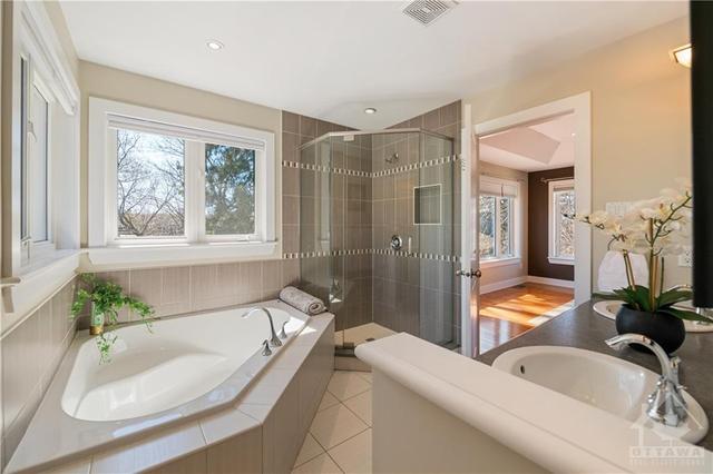 Primary ensuite with soaker tub, glassed in shower & separate water closet | Image 16