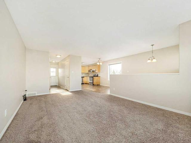 1102 44 Avenue N, Home with 3 bedrooms, 1 bathrooms and 3 parking in Lethbridge AB | Image 11