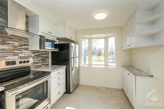 e - 61 Woodfield Drive, Townhouse with 3 bedrooms, 2 bathrooms and 1 parking in Ottawa ON | Image 10