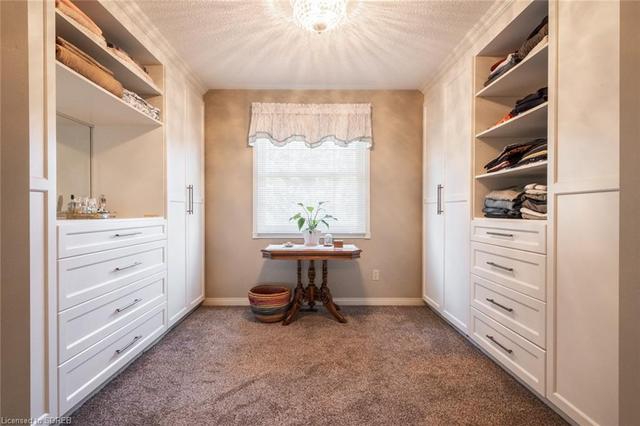 Walk-in closet with custom built-ins | Image 31