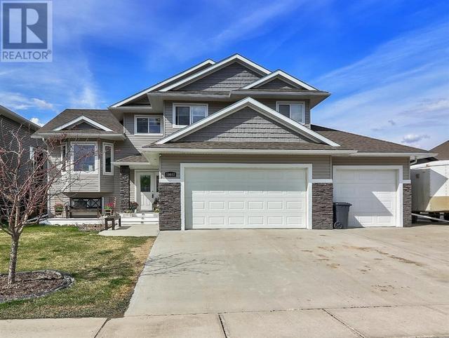10602 155 Avenue, House detached with 5 bedrooms, 3 bathrooms and 8 parking in Grande Prairie County No. 1 AB | Card Image