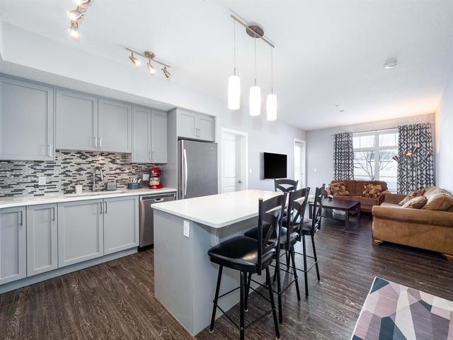 1110 - 3727 Sage Hill Drive Nw, Condo with 2 bedrooms, 2 bathrooms and 1 parking in Calgary AB | Image 6