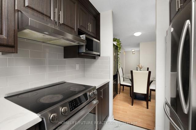 411 - 10 Tapscott Rd, Condo with 2 bedrooms, 2 bathrooms and 1 parking in Toronto ON | Image 11