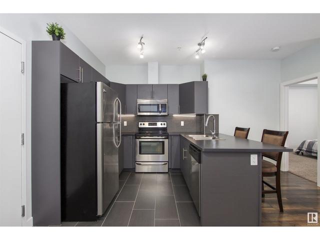210 - 10611 117 St Nw, Condo with 2 bedrooms, 2 bathrooms and 2 parking in Edmonton AB | Image 11