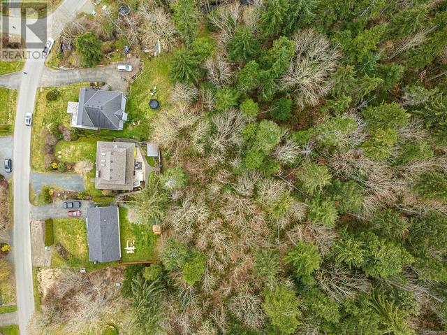224 Spindrift Rd, House detached with 2 bedrooms, 3 bathrooms and 6 parking in Comox Valley A BC | Image 47