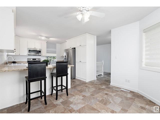 10640 153 Av Nw, House attached with 2 bedrooms, 1 bathrooms and 4 parking in Edmonton AB | Image 6