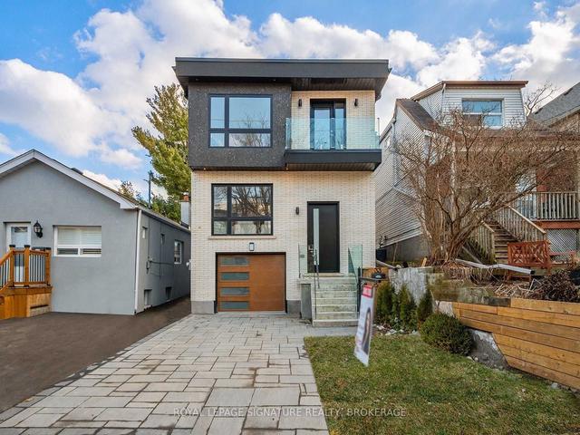 33 Wallington Ave, House detached with 4 bedrooms, 4 bathrooms and 3 parking in Toronto ON | Image 1