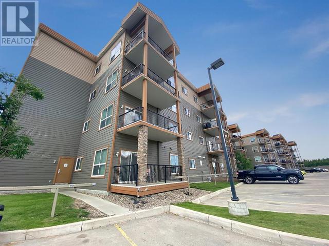 404, - 9221 Lakeland Drive, Condo with 2 bedrooms, 2 bathrooms and 2 parking in Grande Prairie AB | Card Image