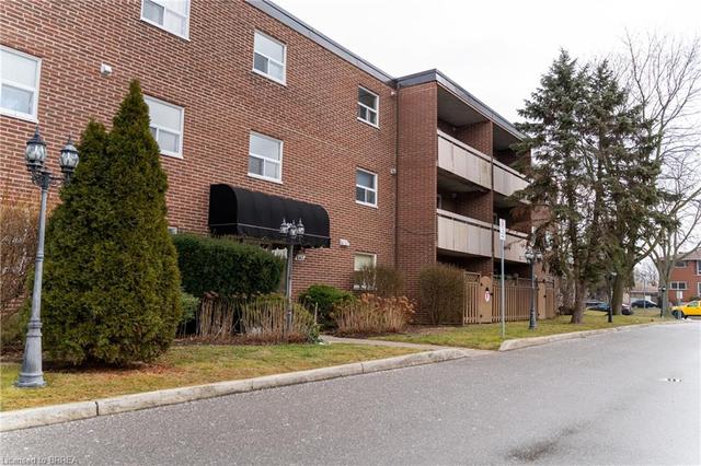 101 - 640 Grey Street, House attached with 2 bedrooms, 1 bathrooms and 1 parking in Brantford ON | Image 1