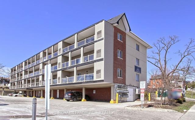 204 - 128 Barrie St, Condo with 1 bedrooms, 1 bathrooms and 1 parking in Bradford West Gwillimbury ON | Image 1