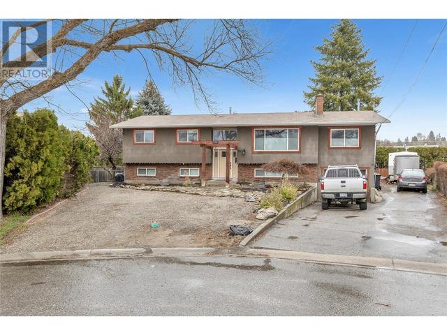 700 Tamarack Drive, House detached with 4 bedrooms, 3 bathrooms and 7 parking in Kelowna BC | Image 1