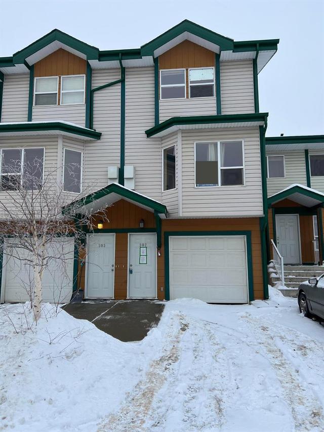 302 - 123 Arabian Drive, Home with 2 bedrooms, 1 bathrooms and 2 parking in Wood Buffalo AB | Image 1