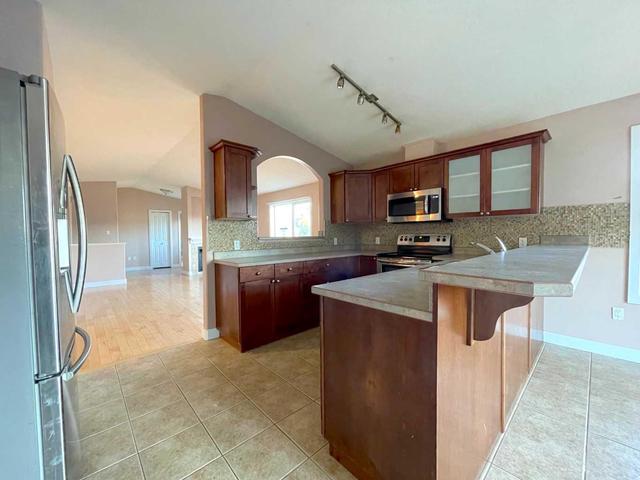 138 Peyton Way, House detached with 6 bedrooms, 3 bathrooms and 4 parking in Wood Buffalo AB | Image 9