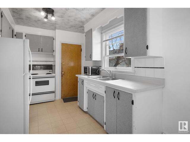 11112/11116 116 St Nw Nw, House attached with 2 bedrooms, 4 bathrooms and null parking in Edmonton AB | Image 16