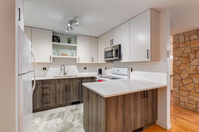 32 - 12625 24 Street Sw, Home with 2 bedrooms, 2 bathrooms and 2 parking in Calgary AB | Image 10