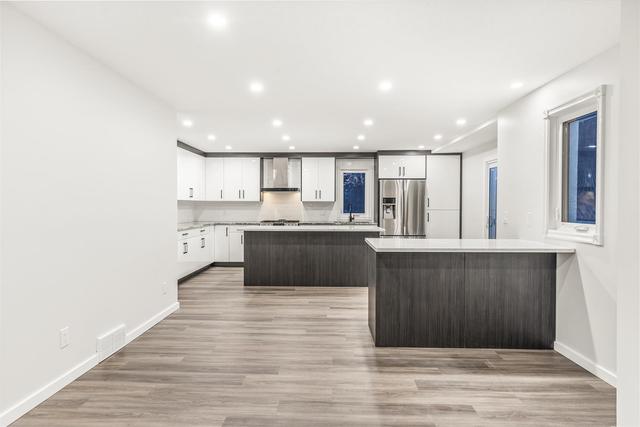 176 Hawkwood Way Nw, House detached with 6 bedrooms, 4 bathrooms and 4 parking in Calgary AB | Image 17