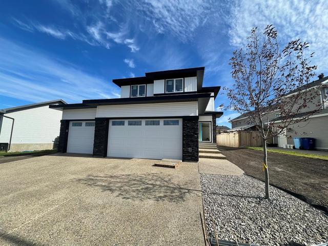 304 Beacon Hill Drive, House detached with 4 bedrooms, 3 bathrooms and 6 parking in Wood Buffalo AB | Image 1