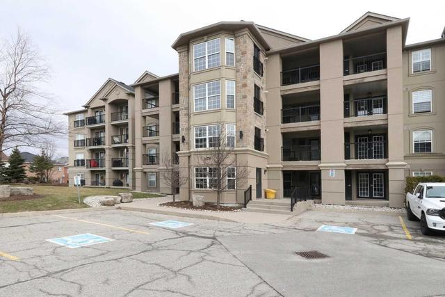 405 - 1479 Maple Ave, Condo with 2 bedrooms, 1 bathrooms and 1 parking in Milton ON | Image 2
