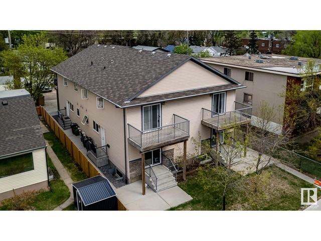 1 - 11841 97 St Nw, House attached with 3 bedrooms, 2 bathrooms and null parking in Edmonton AB | Image 2