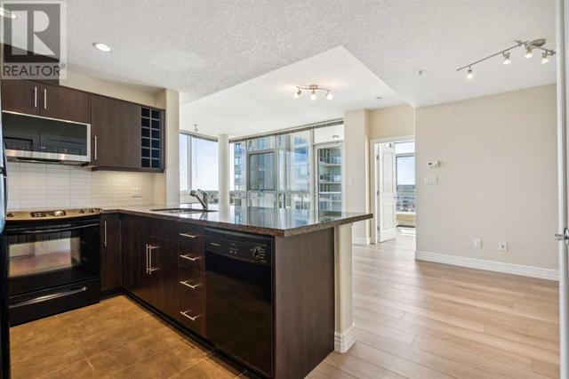 703, - 55 Spruce Place Sw, Condo with 2 bedrooms, 2 bathrooms and 1 parking in Calgary AB | Image 4