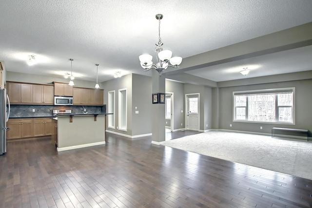 66 Aspen Hills Way Sw, House detached with 7 bedrooms, 4 bathrooms and 4 parking in Calgary AB | Image 16