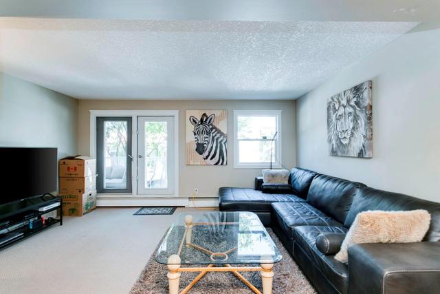 104 - 2010 35 Avenue Sw, Condo with 2 bedrooms, 1 bathrooms and 1 parking in Calgary AB | Card Image