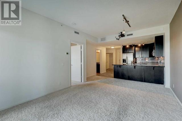 709, - 1410 1 Street Se, Condo with 1 bedrooms, 1 bathrooms and 2 parking in Calgary AB | Image 4