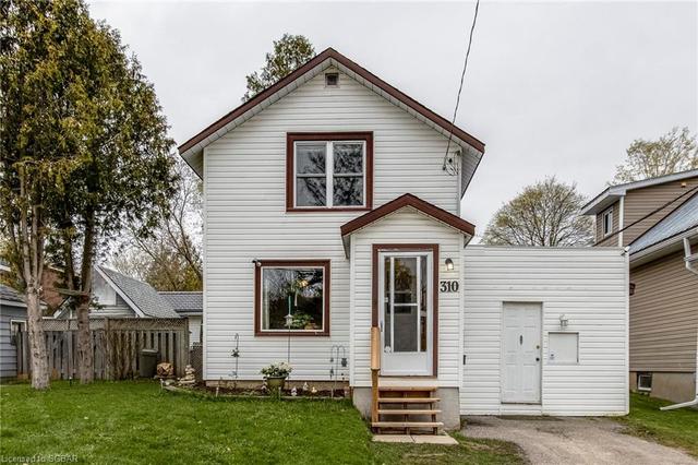 310 Bay Street, House detached with 2 bedrooms, 1 bathrooms and null parking in Midland ON | Image 1