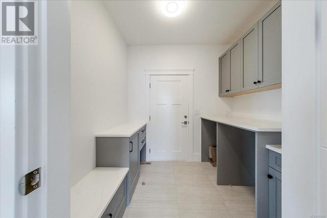 Laundry Room with access to the garage | Image 25