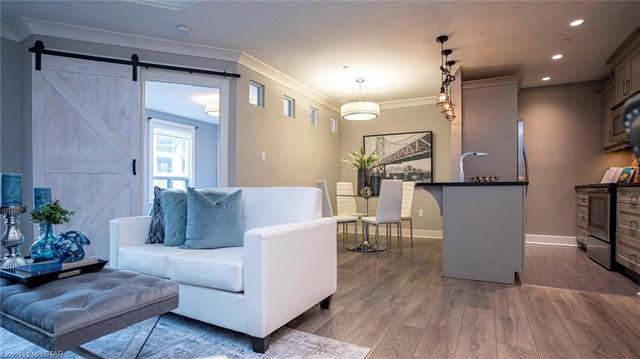 212 - 320 Sugarcreek Trail, House attached with 1 bedrooms, 1 bathrooms and 2 parking in London ON | Image 9