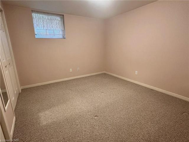 The third bedroom is located in the basement. | Image 29