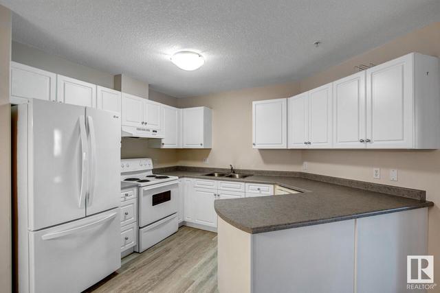 306 - 9930 100 Av, Condo with 2 bedrooms, 2 bathrooms and 1 parking in Fort Saskatchewan AB | Image 18
