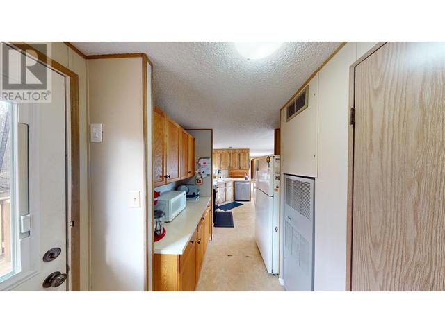 13610 Wolsey Subdiv, House other with 5 bedrooms, 3 bathrooms and null parking in Peace River B BC | Image 8