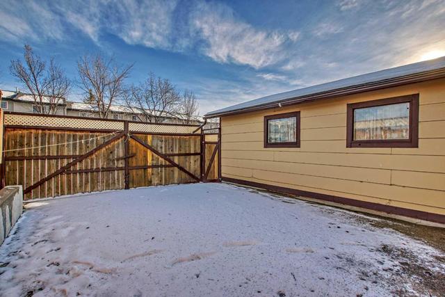 40 Falconridge Close Ne, Home with 3 bedrooms, 1 bathrooms and 2 parking in Calgary AB | Image 43