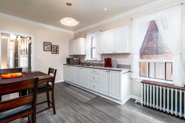 34 Rolyat St, House attached with 4 bedrooms, 2 bathrooms and 2 parking in Toronto ON | Image 2