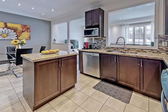 58 Millhouse Crt, House attached with 4 bedrooms, 4 bathrooms and 4 parking in Vaughan ON | Image 2