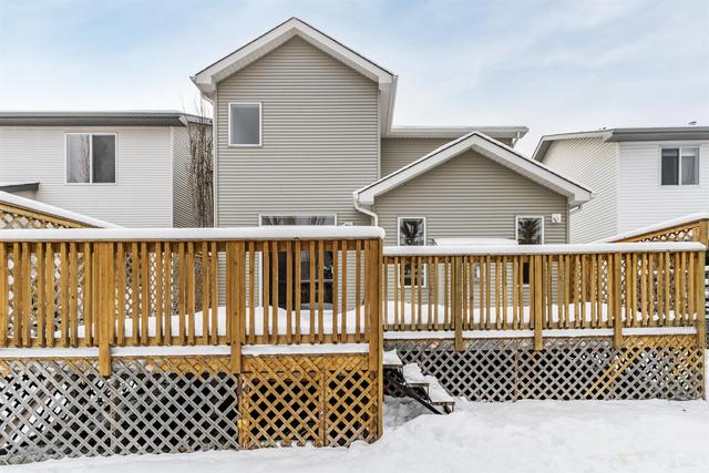 82 Cougarstone Circle Sw, House detached with 4 bedrooms, 2 bathrooms and 4 parking in Calgary AB | Image 33