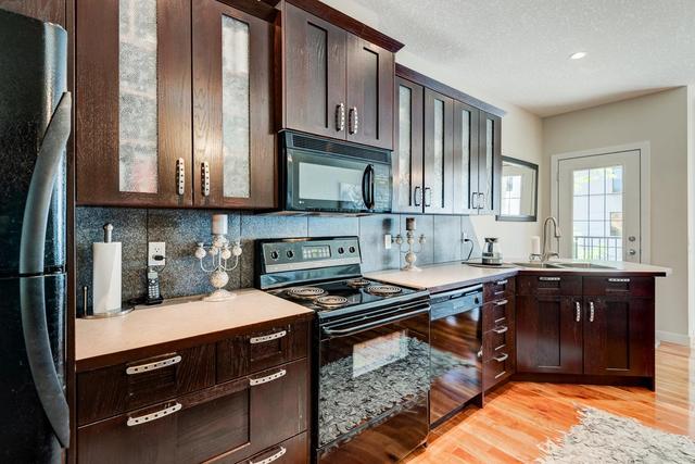1305 7 Street Sw, Home with 2 bedrooms, 2 bathrooms and 2 parking in Calgary AB | Image 13