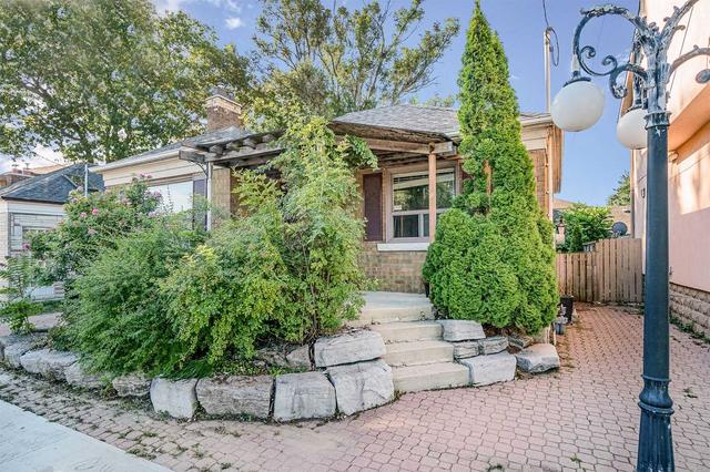 toronto - 617 The Queensway Ave, House detached with 2 bedrooms, 2 bathrooms and 2 parking in Toronto ON | Image 1