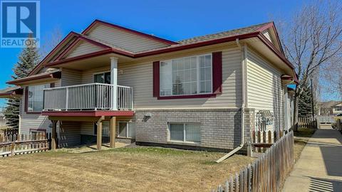 52, - 103 Addington Drive, House attached with 2 bedrooms, 1 bathrooms and 2 parking in Red Deer AB | Card Image